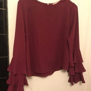 Burgundy purple blouse.